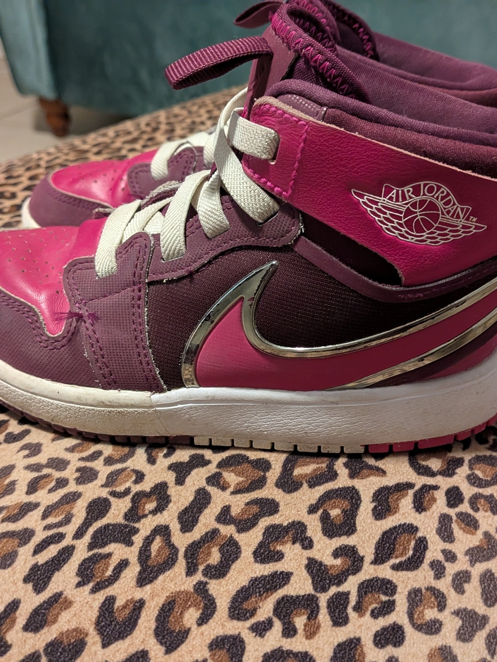 Jordan Women’s High-Top Sneakers in Pink/Purple